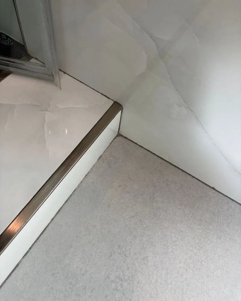 The same shower threshold corner clean and dry