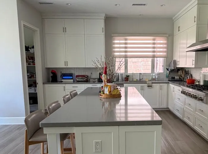 Kitchen island and counters wiped clean