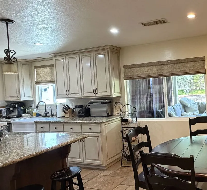Open kitchen and dining area after a cleaning