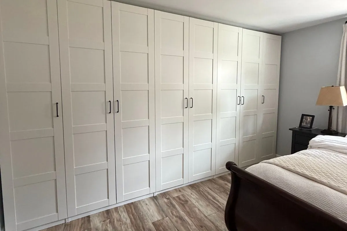 Neatly arranged bedroom wardrobe wall